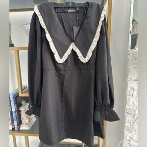 Chic Black Long Sleeve Dress with Cream Trim